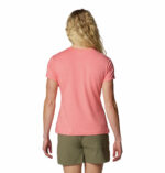 A women wearing a pink graphic t-shirt