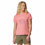 A women wearing a pink graphic t-shirt
