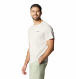 A man wearing a grey short sleeve shirt