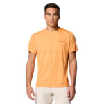A man wearing a orange short sleeve shirt