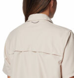 A Women wearing a brown short sleeve shirt