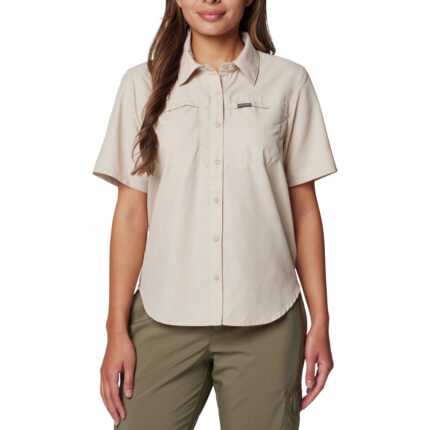 A Women wearing a brown short sleeve shirt