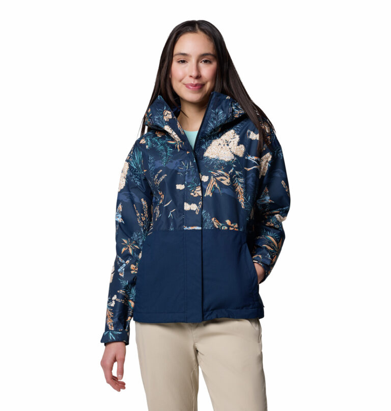 A women wearing a blue muli coloured jacket