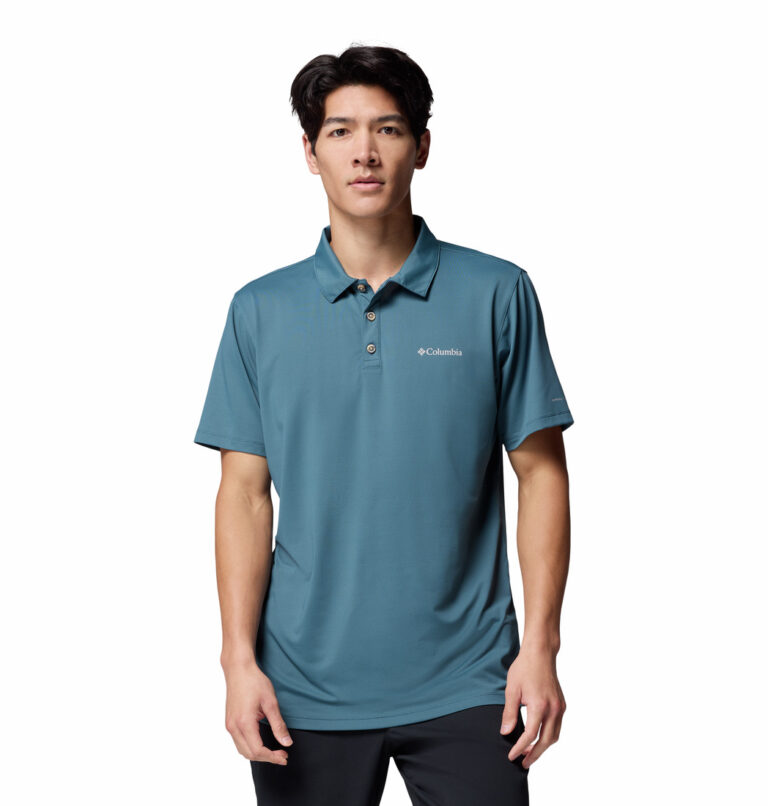 A man wearing a blue polo shirt