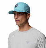 a man wearing a blue cap