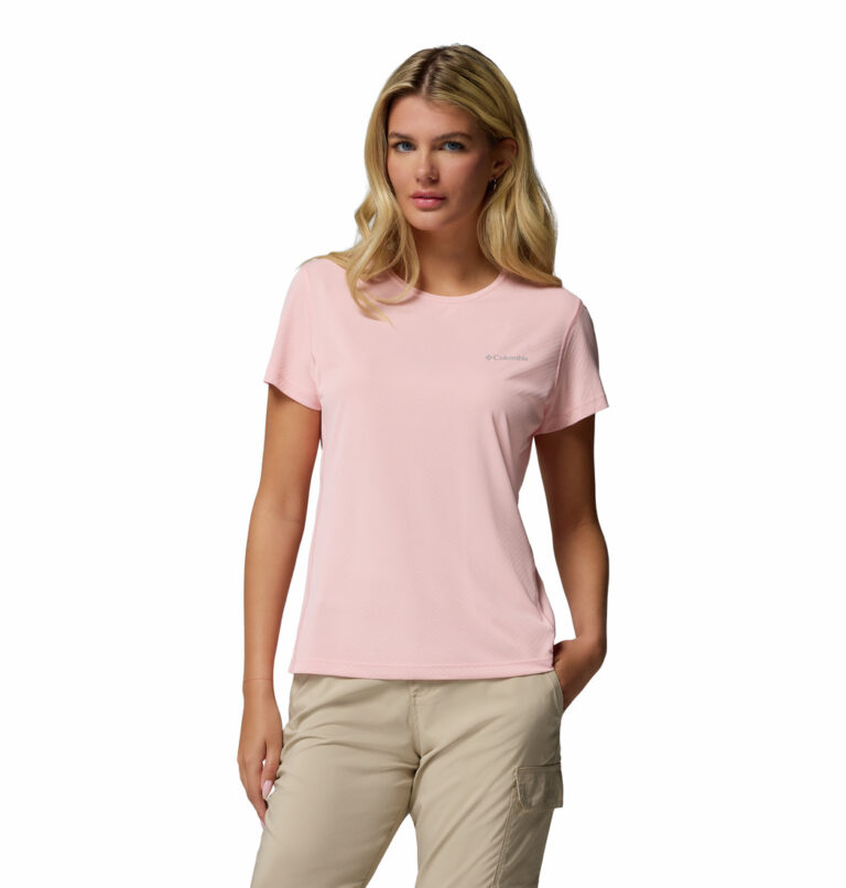 A women wearing a pink Zero Rules Light Short Sleeve Crew Shirt