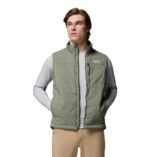 A man wearing a brown vest
