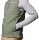 A man wearing a brown vest