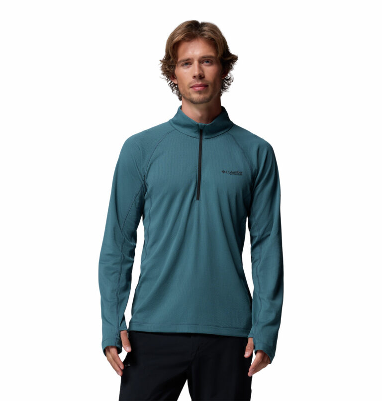 A man wearing a blue long sleeve top