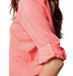 A women wearing a pink long sleeve shirt