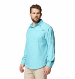 A man wearing a blue long sleeve shirt