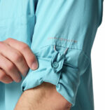A man wearing a blue long sleeve shirt