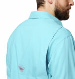 A man wearing a blue long sleeve shirt