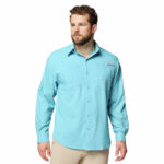 A man wearing a blue long sleeve shirt