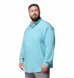 A man wearing a blue long sleeve shirt
