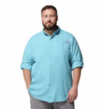 A man wearing a blue long sleeve shirt