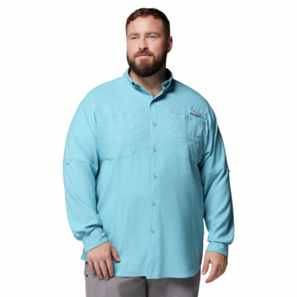 A man wearing a blue long sleeve shirt