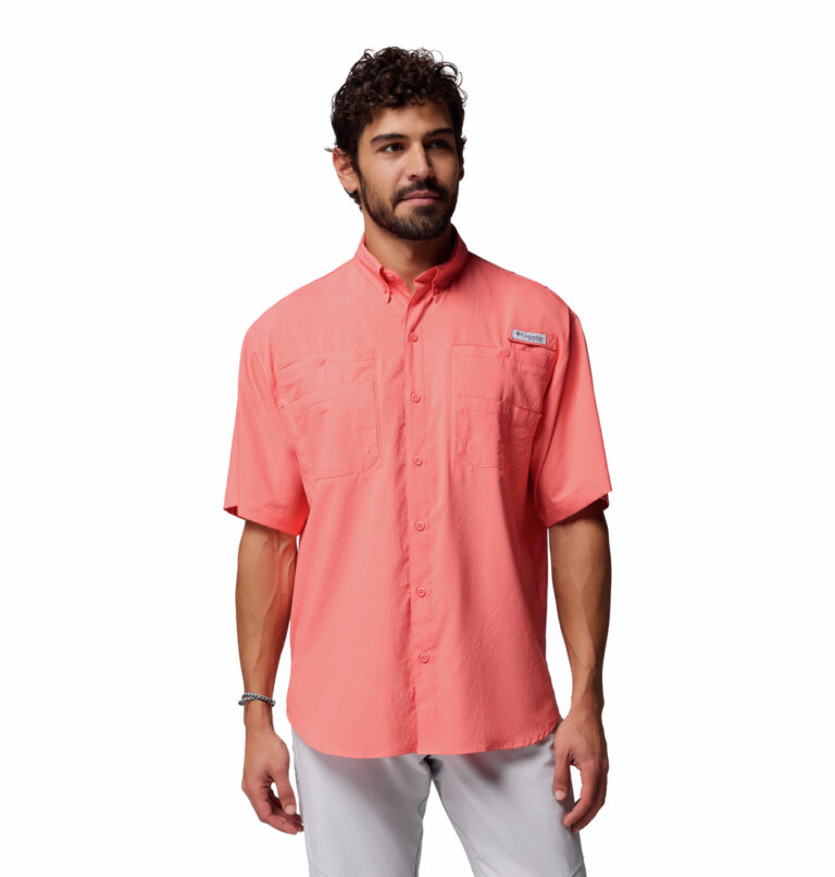 A man wearing a pink short sleeve shirt
