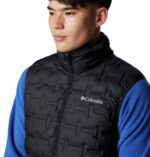 A man wearing a black vest