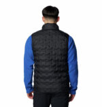 A man wearing a black vest