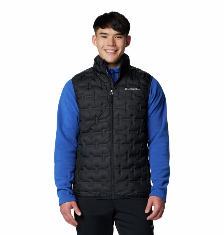 A man wearing a black vest