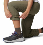 a women wearing brown pants