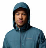 a man wearing a blue jacket