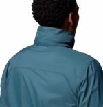 a man wearing a blue jacket