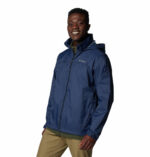 a man wearing a blue jacket
