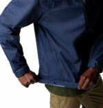 a man wearing a blue jacket