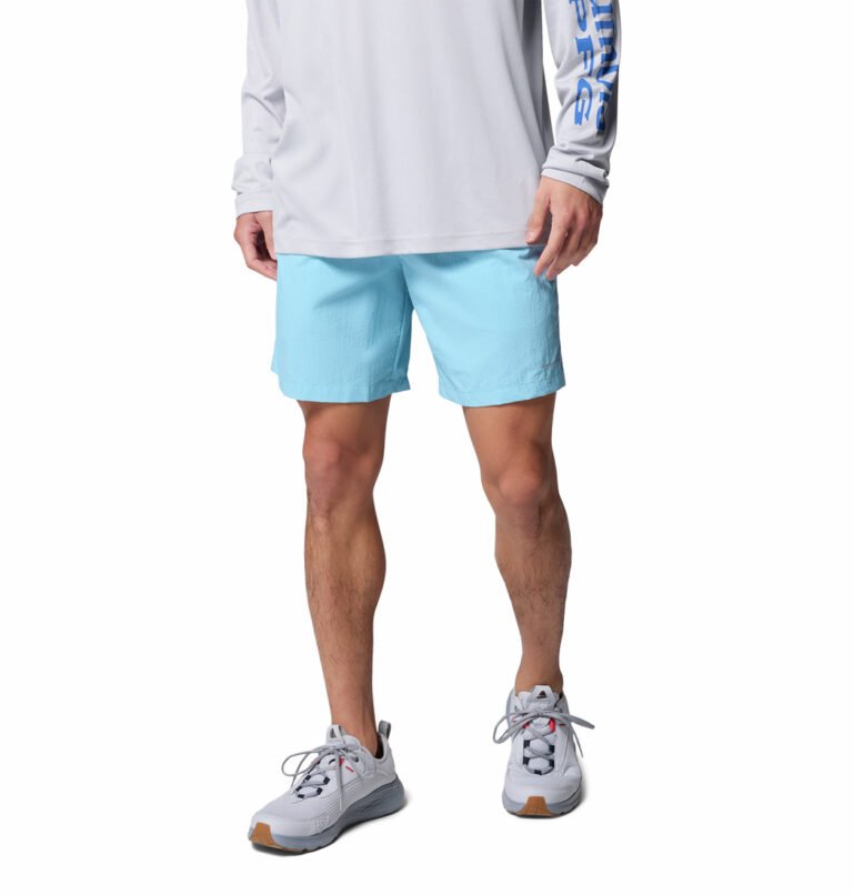 a man wearing blue shorts