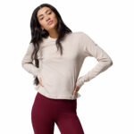 a women wearing a brown long sleeve crew shirt
