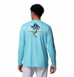 A man wearing a blue long sleeve shirt