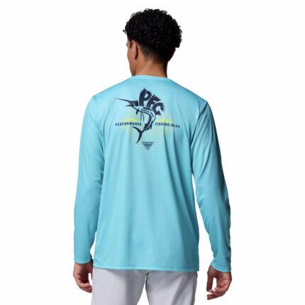 A man wearing a blue long sleeve shirt