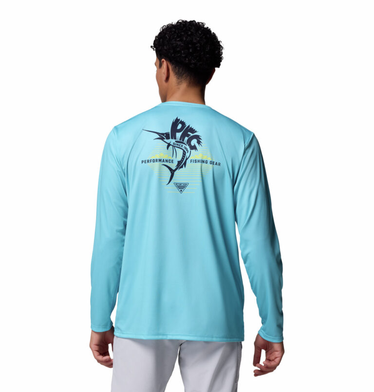 A man wearing a blue long sleeve shirt