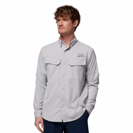 a man wearing a grey long sleeve shirt