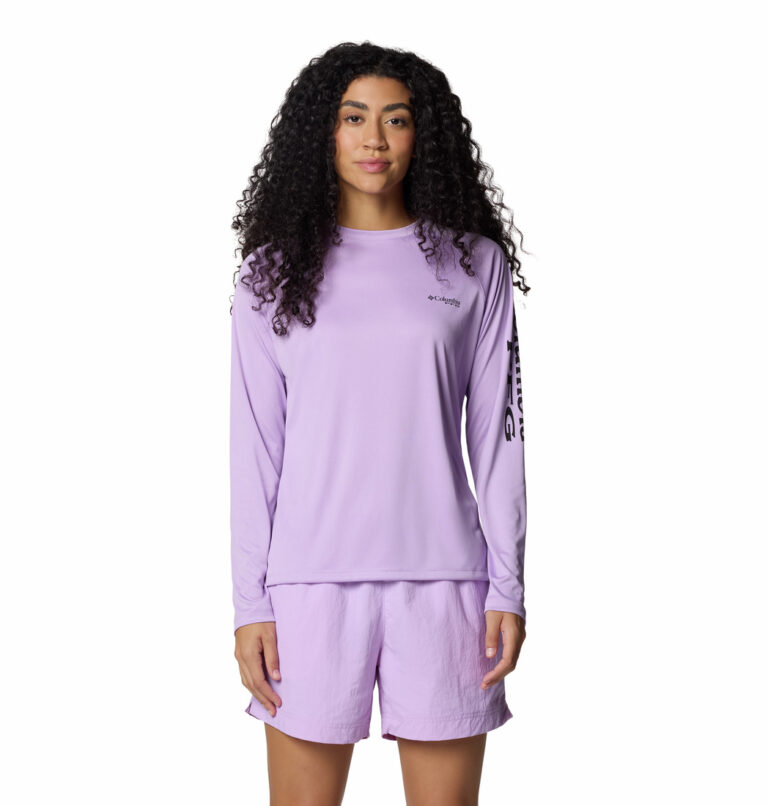 a women wearing a purple long sleeve tee