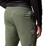 A man wearing brown stretch pants