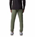 A man wearing brown stretch pants