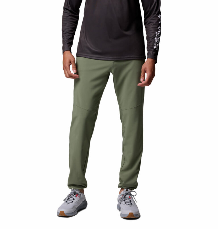 A man wearing brown stretch pants