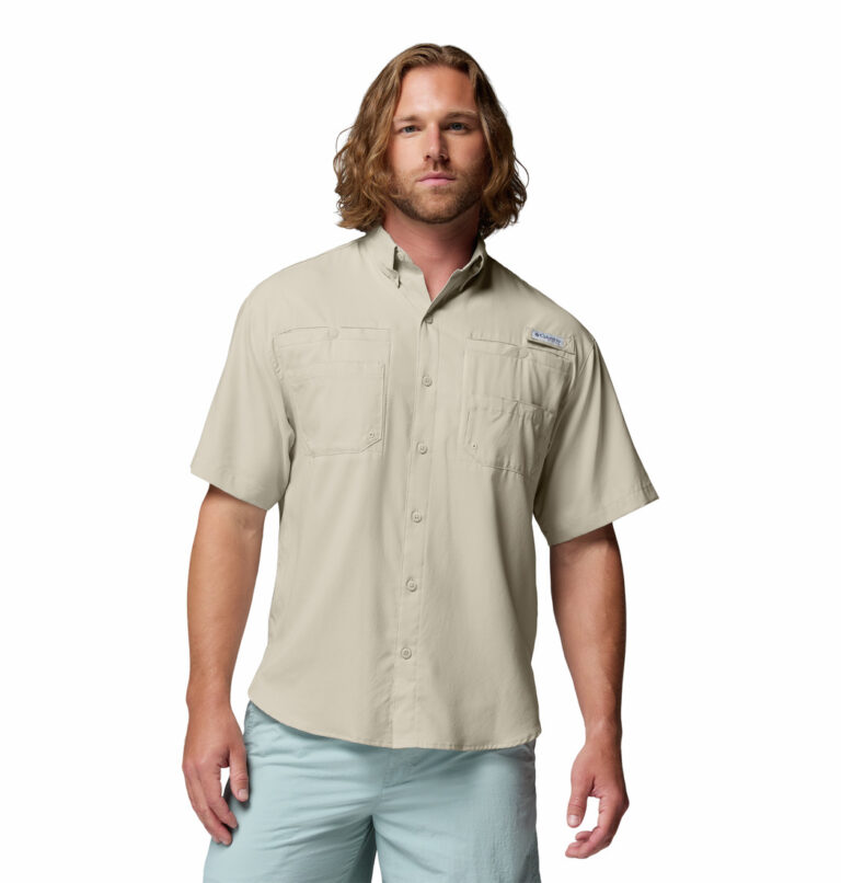 a man wearing a brown Tamiami II Short Sleeve Shirt