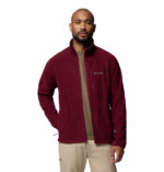 a man wearing a red fleece top