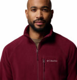 a man wearing a red fleece top