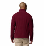 a man wearing a red fleece top