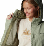 a women wearing a brown Arcadia II Jacket