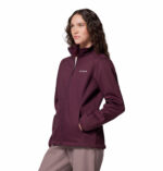 a women wearing a red Kruser Ridge III Softshell Jacket