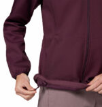 a women wearing a red Kruser Ridge III Softshell Jacket
