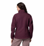a women wearing a red Kruser Ridge III Softshell Jacket