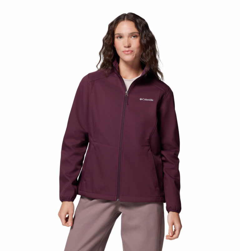 a women wearing a red Kruser Ridge III Softshell Jacket