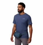 a man wearing a blue hip pack